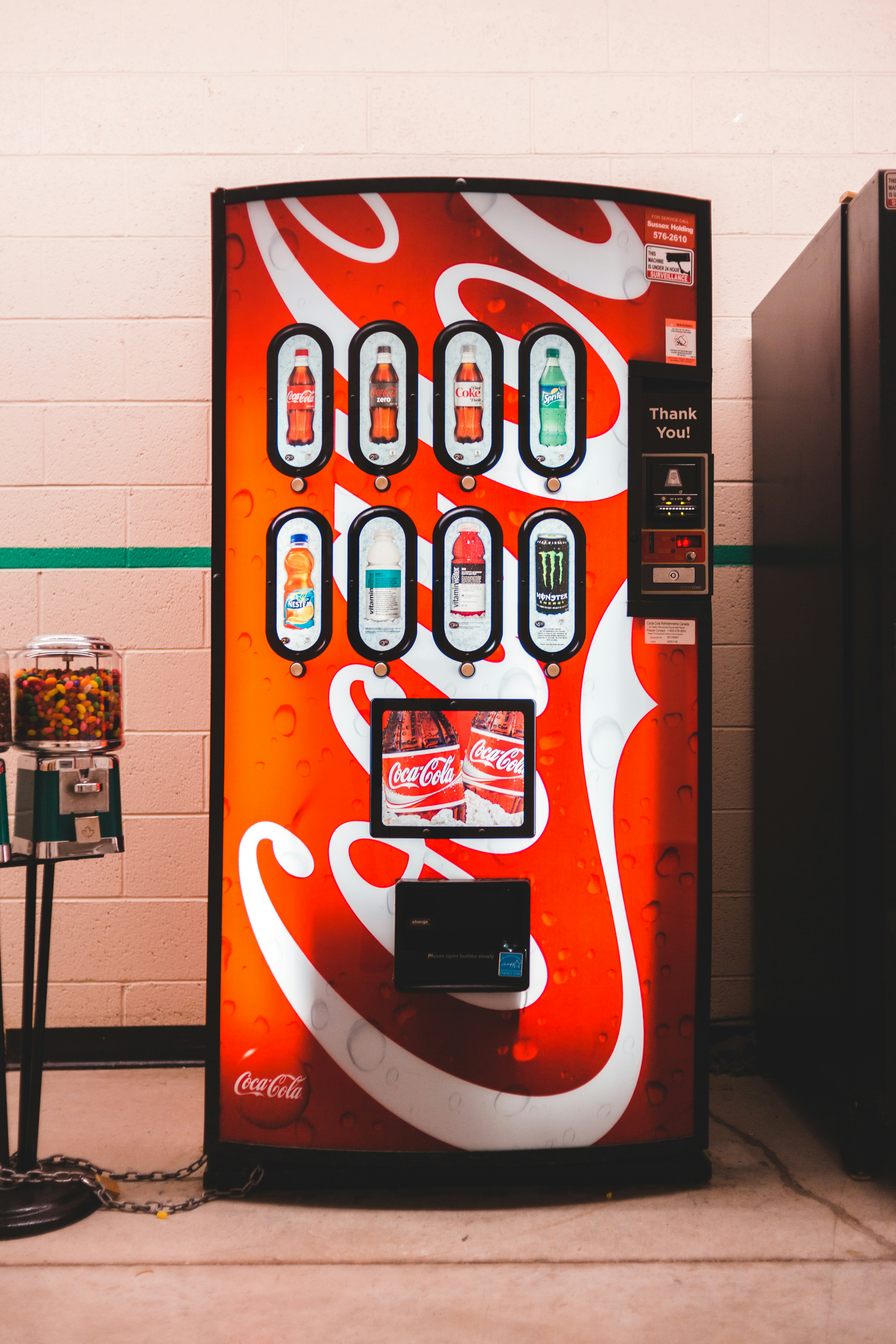 Coca-Cola bottles in a vending machine